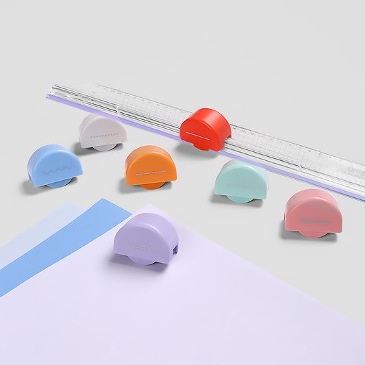 Seven-in-one multi-functional paper cutter