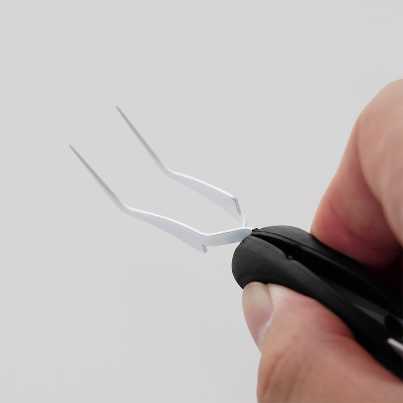 CHAOS Two sets of X-shaped handcrafted reverse tweezers